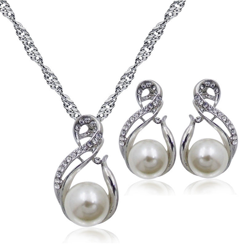 Geometric Figure Eight Pearl Necklace With Diamonds